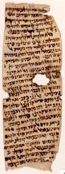 fig. 1: This Genizah fragment is from a commentary on a piyyut, or liturgical poem, in which thirteen difficult and rare words are used. The commentator provides definitions in Arabic (the vernacular of Jews living under medieval Islam) and compares their meanings with Hebrew biblical citations.